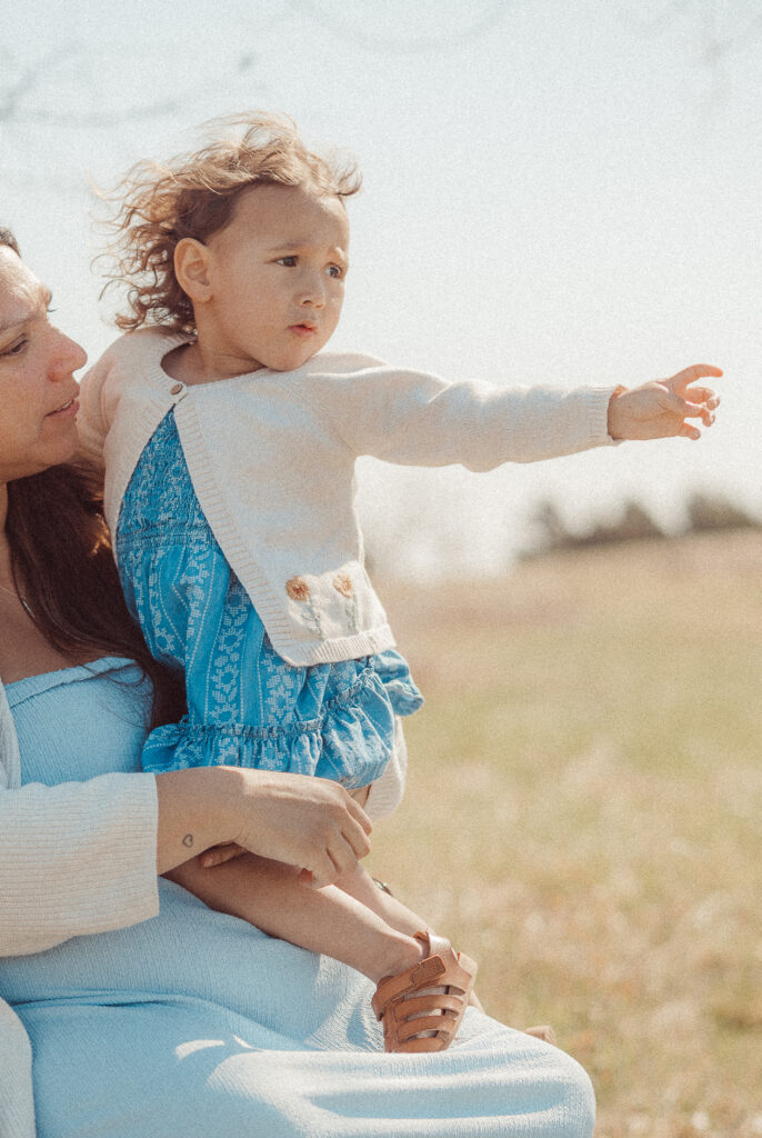 child looks into the distance during mother's day mini session in Lawton, OK
