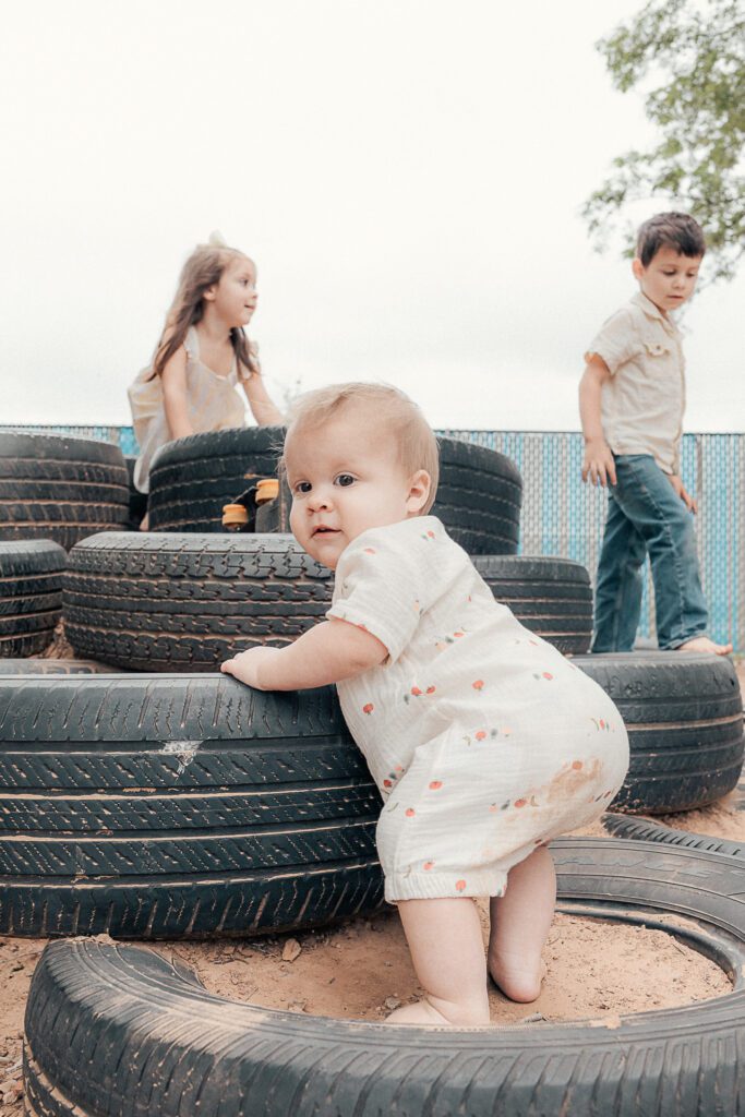 kids climb on playground at the scissortail school in lawton, ok
